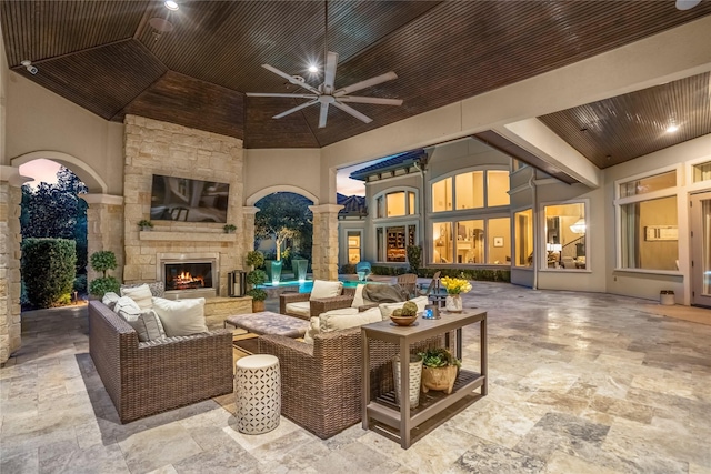 27 S Glenwild Cir, The Woodlands, TX 77389 - view of patio featuring ceiling fan and an outdoor living space with a fireplace