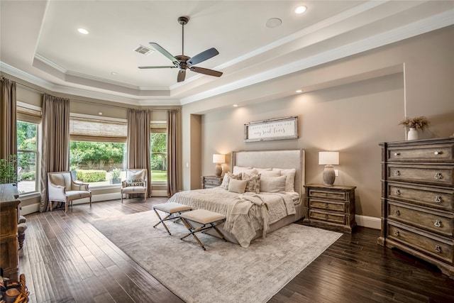 27 S Glenwild Cir, The Woodlands, TX 77389 - bedroom featuring a raised ceiling, ornamental molding, dark wood-type flooring, recessed lighting, and a ceiling fan