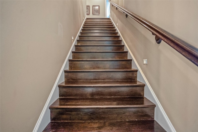 27 S Glenwild Cir, The Woodlands, TX 77389 - stairs with baseboards