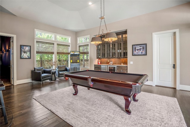 27 S Glenwild Cir, The Woodlands, TX 77389 - playroom featuring a high ceiling, billiards, dark wood-type flooring, and bar