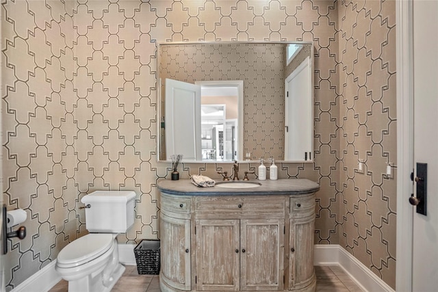 27 S Glenwild Cir, The Woodlands, TX 77389 - bathroom featuring wallpapered walls and vanity