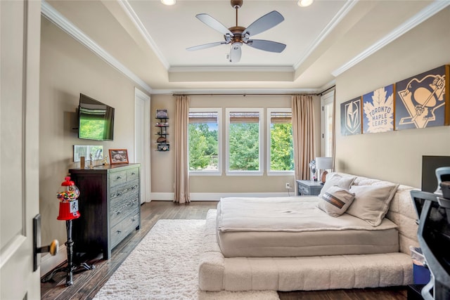 27 S Glenwild Cir, The Woodlands, TX 77389 - bedroom with a tray ceiling, ornamental molding, dark wood-style floors, recessed lighting, and a ceiling fan