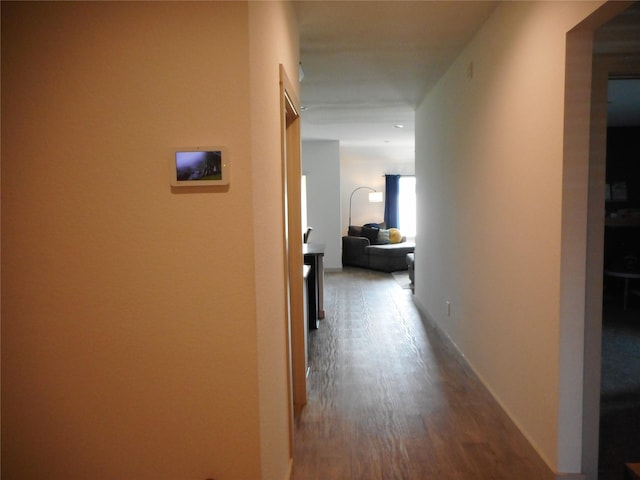 8227 Precious Passing Way, Rosharon, TX 77583 - hallway featuring dark wood finished floors and baseboards