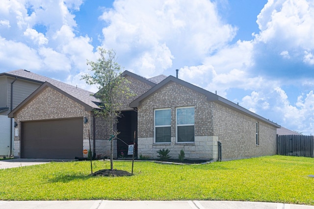 8227 Precious Passing Way, Rosharon, TX 77583 - ranch-style house featuring brick siding, an attached garage, driveway, and stone siding