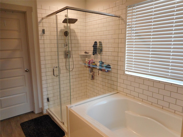 8227 Precious Passing Way, Rosharon, TX 77583 - full bath featuring a stall shower, a bath, and wood finished floors