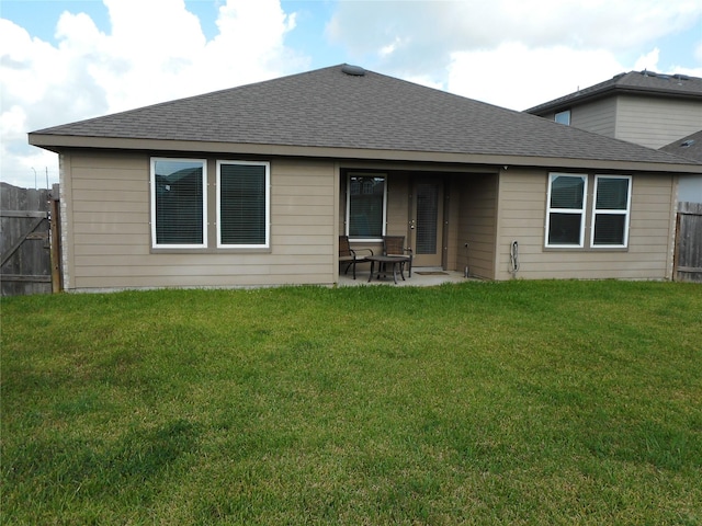 8227 Precious Passing Way, Rosharon, TX 77583 - rear view of house with roof with shingles and a patio area