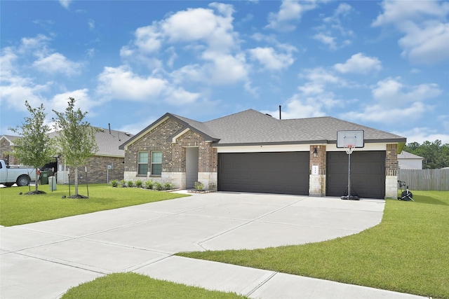 225 Big Spring Dr, Anahuac, TX 77514 - view of front facade featuring an attached garage, driveway, stone siding, and roof with shingles