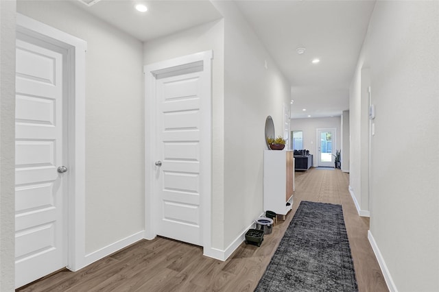 225 Big Spring Dr, Anahuac, TX 77514 - corridor featuring wood finished floors and recessed lighting
