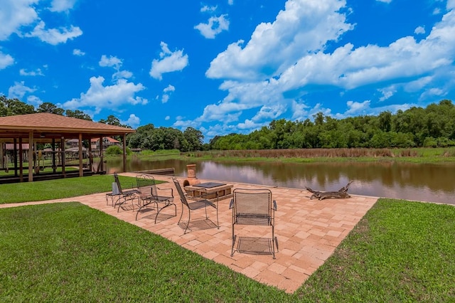 33 Lakeside, Trinity, TX 75862 - view of patio / terrace featuring a water view, a fire pit, and a gazebo