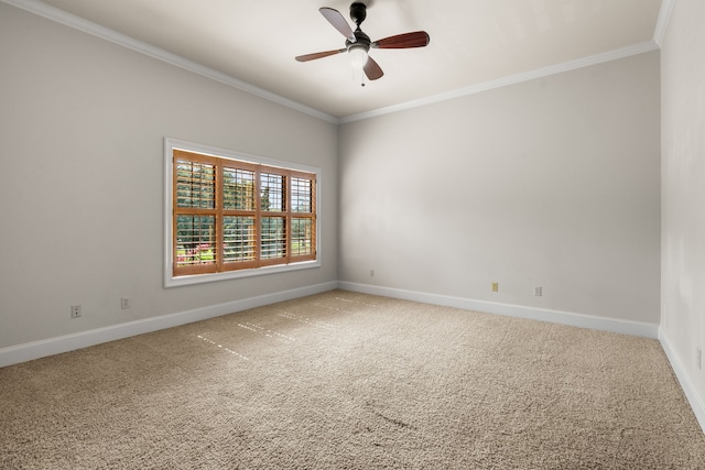 1013 Mulberry Ln, Bellaire, TX 77401 - carpeted spare room featuring a ceiling fan and crown molding