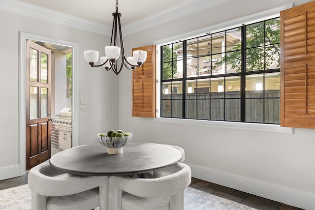 1013 Mulberry Ln, Bellaire, TX 77401 - dining room with a chandelier and crown molding