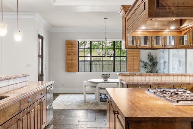 1013 Mulberry Ln, Bellaire, TX 77401 - kitchen with stone tile floors, ornamental molding, stainless steel gas stovetop, decorative light fixtures, and dishwasher