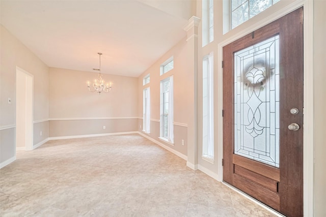 1814 Ferndale Lake Ct, Richmond, TX 77406 - entrance foyer with a chandelier and light tile patterned floors