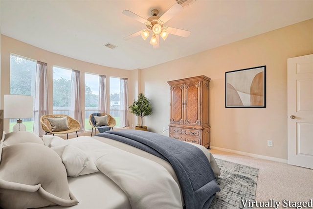1814 Ferndale Lake Ct, Richmond, TX 77406 - bedroom featuring light colored carpet and a ceiling fan