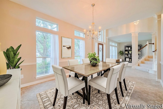 1814 Ferndale Lake Ct, Richmond, TX 77406 - dining room featuring a chandelier, stairs, decorative columns, and light tile patterned floors