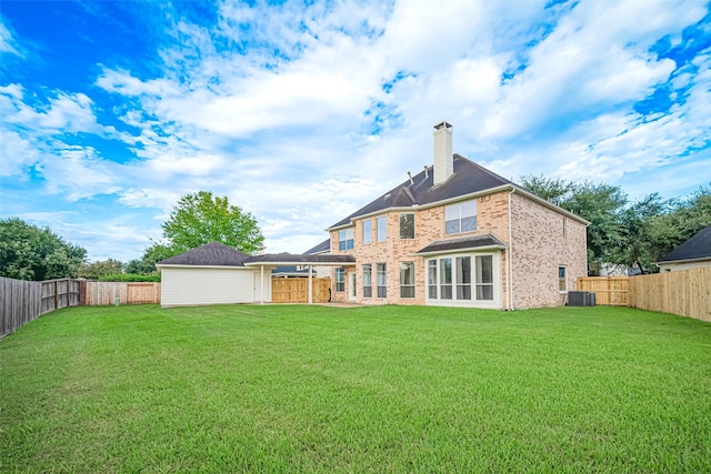 1814 Ferndale Lake Ct, Richmond, TX 77406 - back of house featuring a chimney, brick siding, and a fenced backyard
