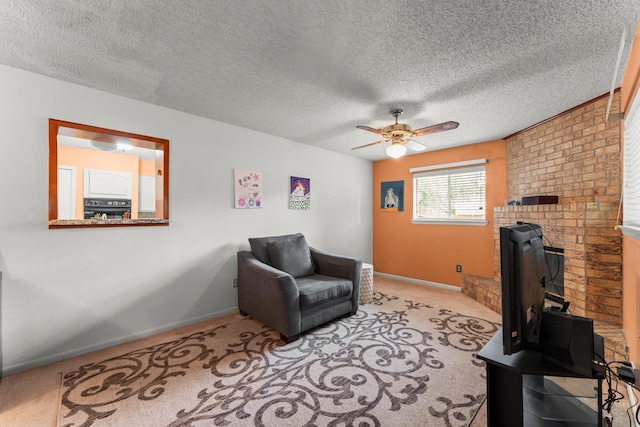 6103 Sunnygate Dr, Spring, TX 77373 - living area with ceiling fan, carpet flooring, and a textured ceiling