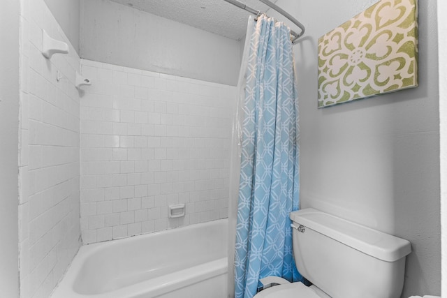 6103 Sunnygate Dr, Spring, TX 77373 - bathroom with shower / bath combination with curtain and a textured ceiling