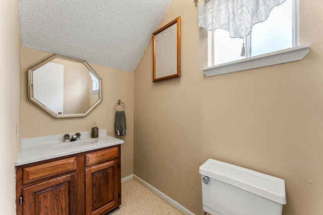 6103 Sunnygate Dr, Spring, TX 77373 - bathroom featuring lofted ceiling and vanity
