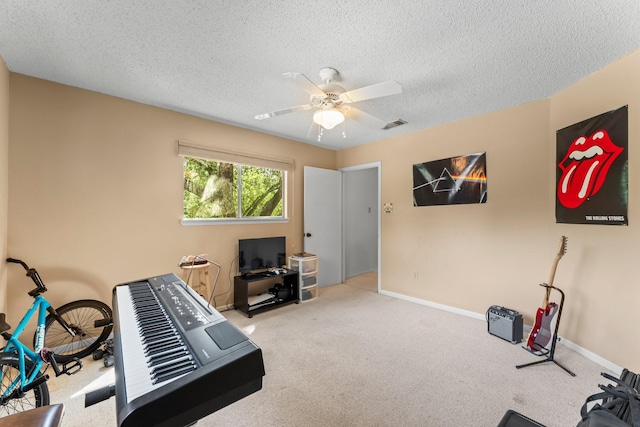 6103 Sunnygate Dr, Spring, TX 77373 - workout room featuring a textured ceiling, carpet flooring, and ceiling fan