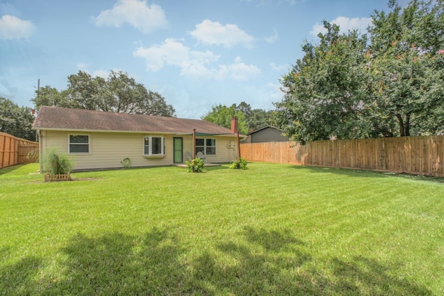 22002 Silver Lode Dr, Katy, TX 77450 - rear view of house with a fenced backyard