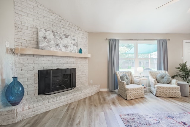22002 Silver Lode Dr, Katy, TX 77450 - living area with wood finished floors, lofted ceiling, and a fireplace