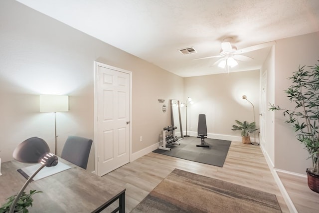 22002 Silver Lode Dr, Katy, TX 77450 - workout area with light wood-style floors and ceiling fan