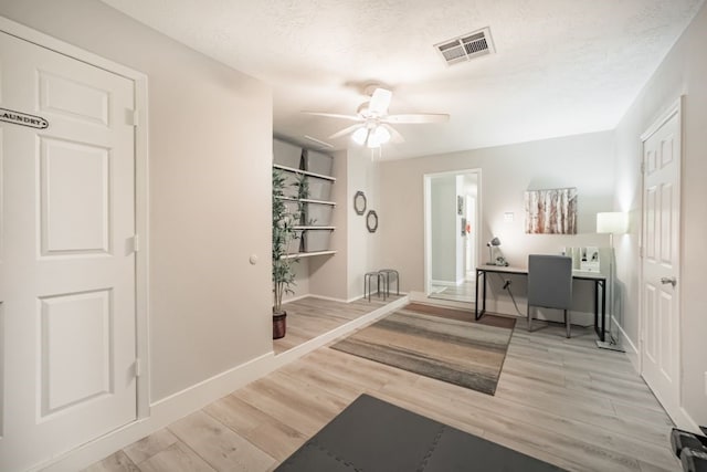 22002 Silver Lode Dr, Katy, TX 77450 - office with a ceiling fan, wood finished floors, and a textured ceiling