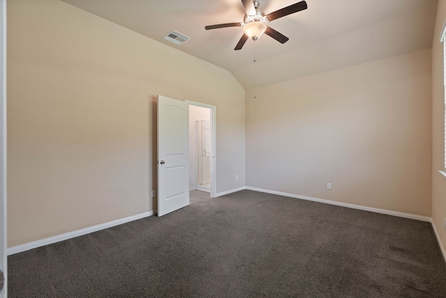 11053 Patriot Ct, Cleveland, TX 77328 - empty room with dark carpet, a ceiling fan, and lofted ceiling