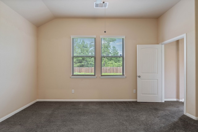 11053 Patriot Ct, Cleveland, TX 77328 - unfurnished room featuring dark carpet and vaulted ceiling