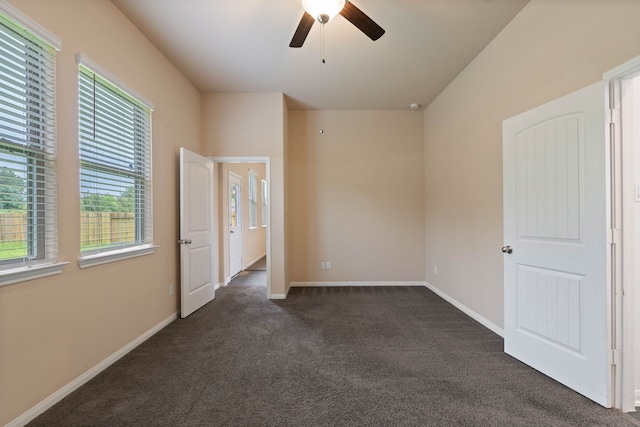 11053 Patriot Ct, Cleveland, TX 77328 - unfurnished bedroom with dark colored carpet and ceiling fan