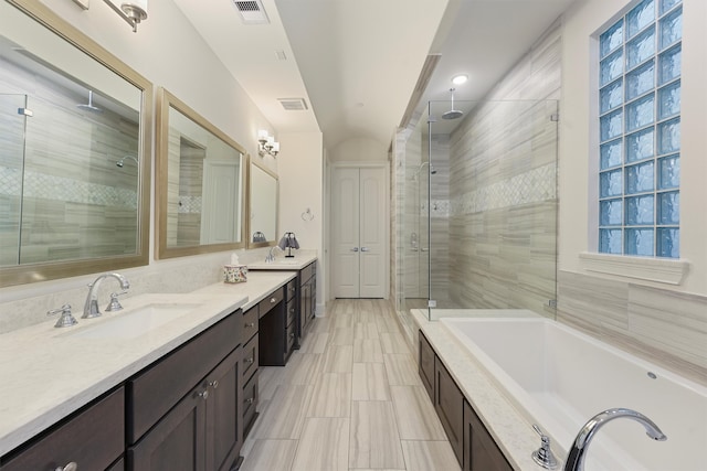 854 Dunleigh Meadows Ln, Houston, TX 77055 - full bathroom with a shower stall, double vanity, and a bath
