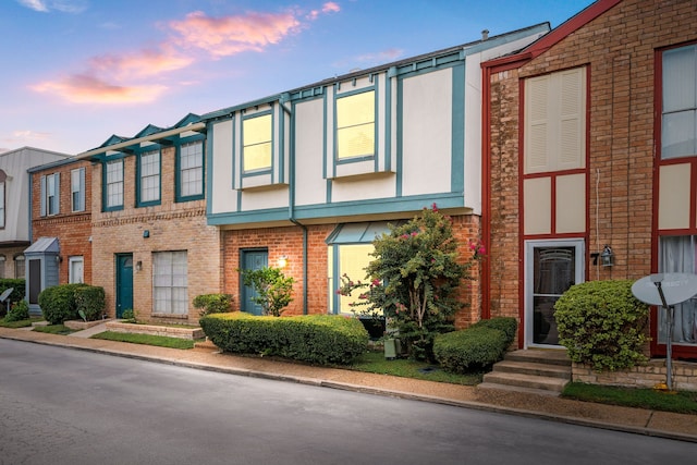 7700 Creekbend Dr Unit 6, Houston, TX 77071 - view of front of home featuring entry steps and brick siding