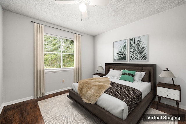 7700 Creekbend Dr Unit 6, Houston, TX 77071 - bedroom featuring wood finished floors, a textured ceiling, and ceiling fan