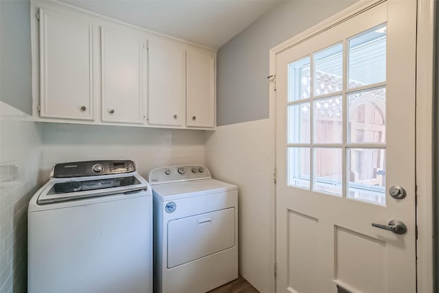 1711 Earl Of Dunmore St, Katy, TX 77449 - washroom featuring washing machine and clothes dryer, cabinet space, and healthy amount of natural light