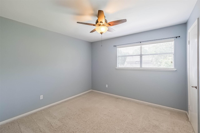 1711 Earl Of Dunmore St, Katy, TX 77449 - empty room with a ceiling fan and light colored carpet