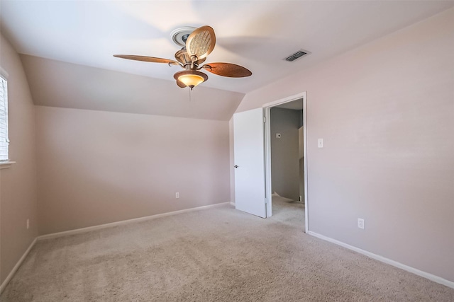 1711 Earl Of Dunmore St, Katy, TX 77449 - empty room featuring a ceiling fan, light colored carpet, and vaulted ceiling