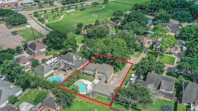 1711 Earl Of Dunmore St, Katy, TX 77449 - aerial perspective of suburban area featuring a pool and property boundaries highlighted