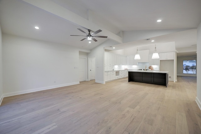 6110 Yarwell Dr, Houston, TX 77096 - unfurnished living room featuring beamed ceiling, light wood-style flooring, a ceiling fan, recessed lighting, and high vaulted ceiling