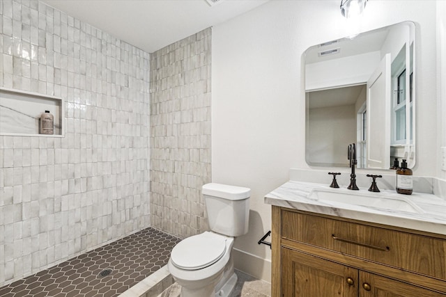 6110 Yarwell Dr, Houston, TX 77096 - bathroom featuring vanity and a tile shower