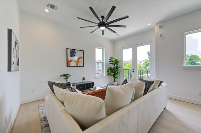 2310 Reinerman St, Houston, TX 77007 - living room featuring recessed lighting, light wood-style floors, and a ceiling fan