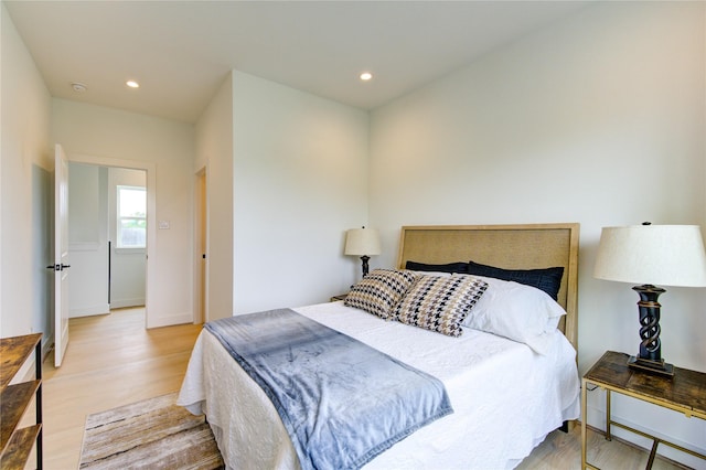 2310 Reinerman St, Houston, TX 77007 - bedroom with light wood-style floors and recessed lighting