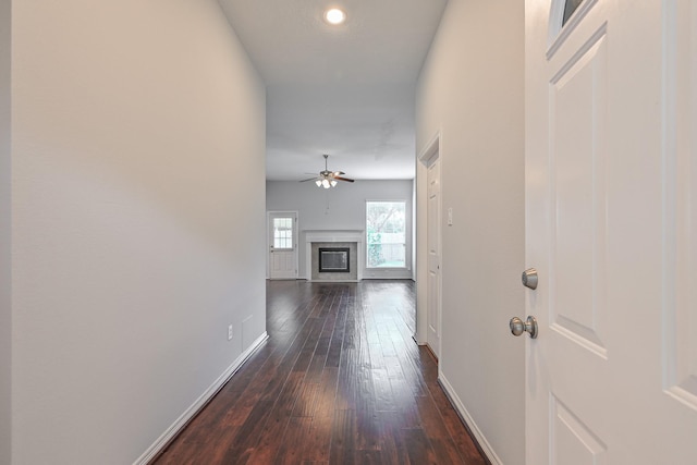 1518 Bugle Run Dr, Katy, TX 77449 - hallway with baseboards and dark wood-type flooring
