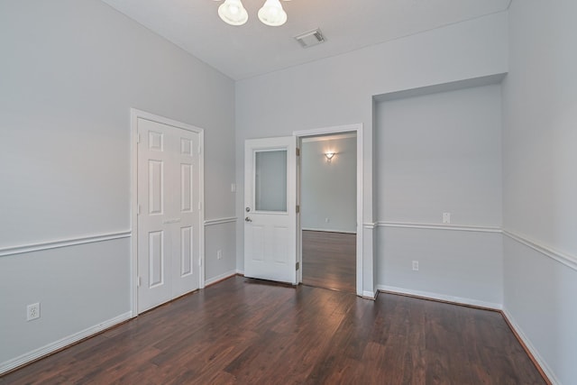 1518 Bugle Run Dr, Katy, TX 77449 - unfurnished bedroom featuring wood finished floors and a chandelier