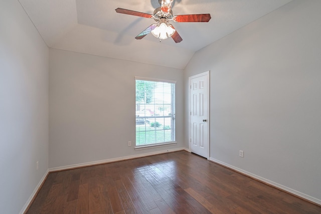 1518 Bugle Run Dr, Katy, TX 77449 - spare room with dark wood-style flooring, ceiling fan, and lofted ceiling