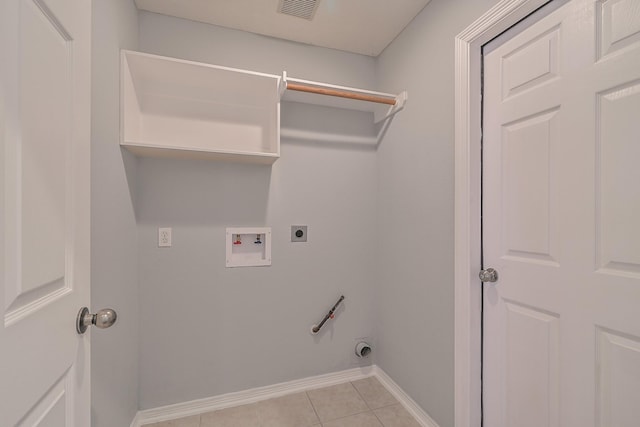 1518 Bugle Run Dr, Katy, TX 77449 - laundry area with hookup for an electric dryer, washer hookup, and light tile patterned flooring