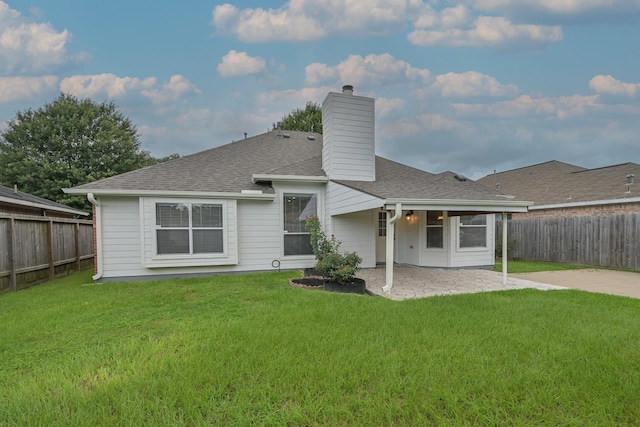 1518 Bugle Run Dr, Katy, TX 77449 - rear view of property with a patio area, a chimney, a fenced backyard, and roof with shingles