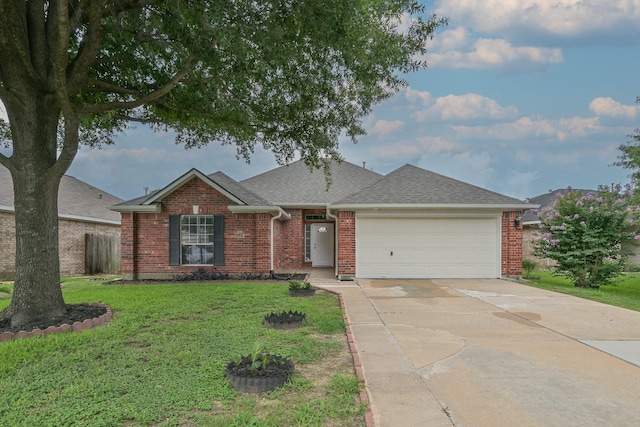 1518 Bugle Run Dr, Katy, TX 77449 - ranch-style home featuring a garage, driveway, a front yard, roof with shingles, and brick siding