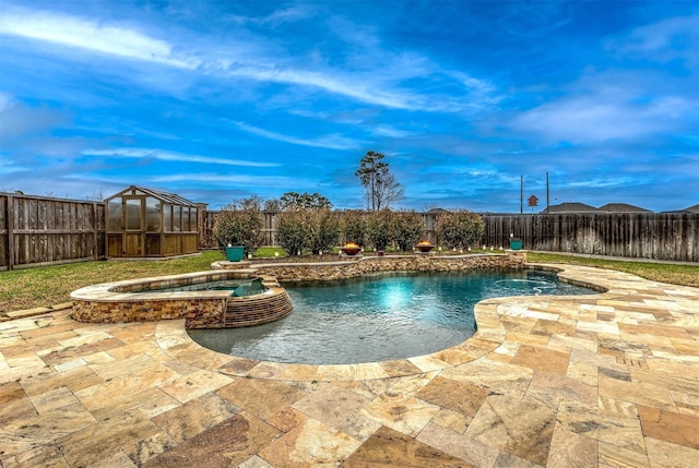 11443 Northam Dr, Tomball, TX 77375 - view of swimming pool with a fenced backyard, a pool with connected hot tub, and a patio area