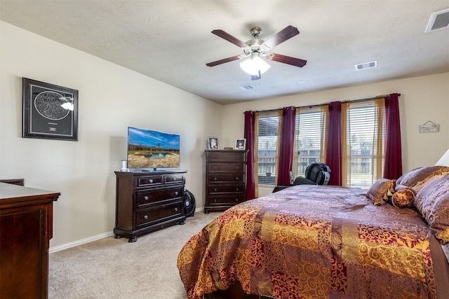 11443 Northam Dr, Tomball, TX 77375 - bedroom featuring light colored carpet and ceiling fan